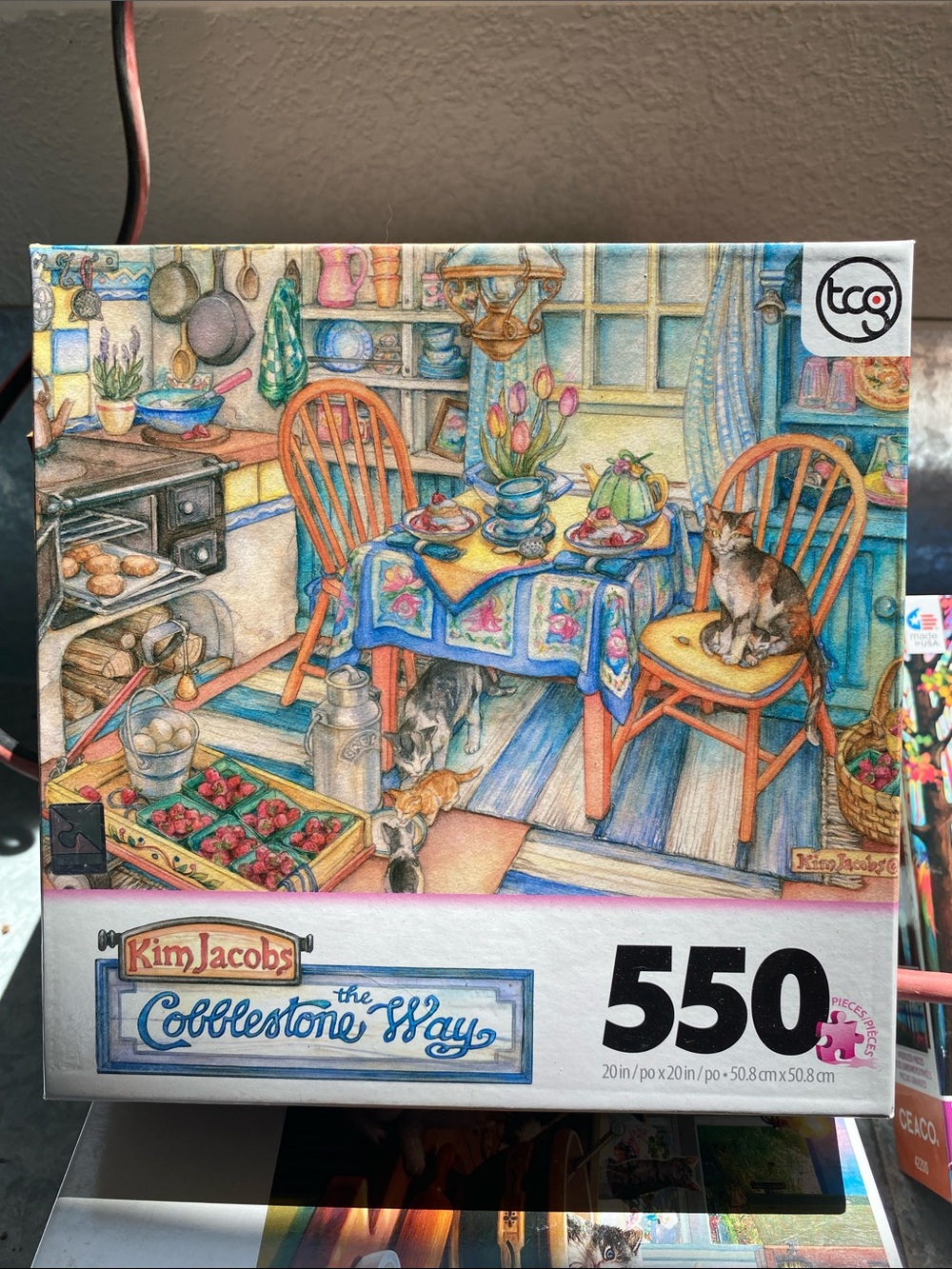Kim Jacobs "The Cobblestone Way" 550-Piece Puzzle - Colorful Kitchen Scene